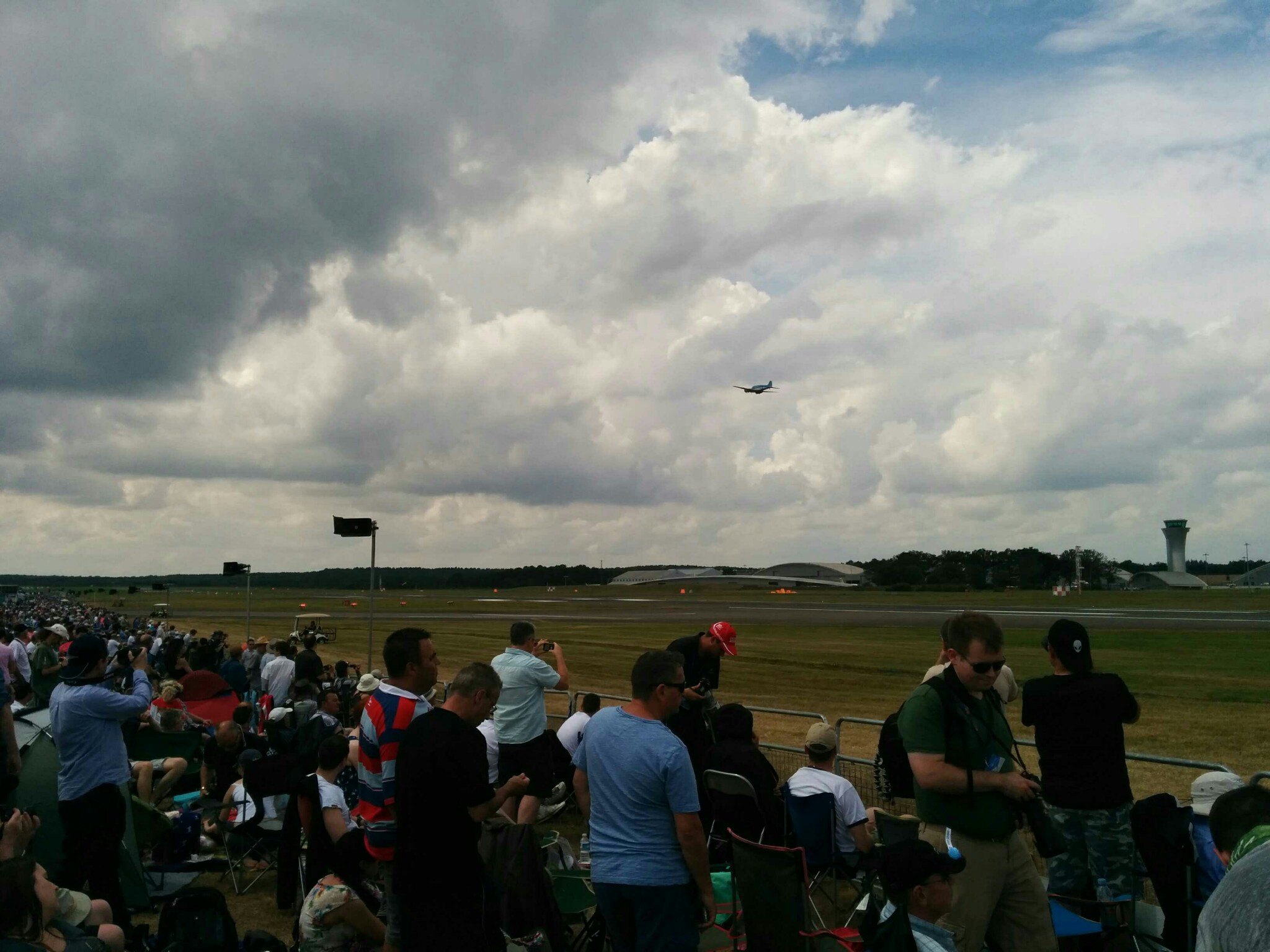 Standing 20m from the runway at Farnborough airshow. Avro Anson in the air.